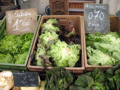 Market stall with lettuce and greens in Paris 11th arrondissement