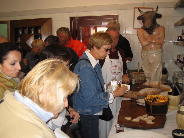 Tourists sampling the food at Dario's shop in Panzano