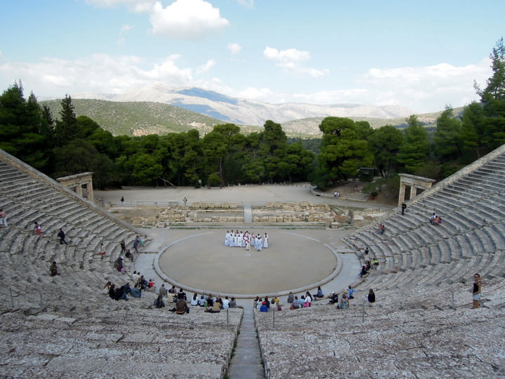 Watching a play at Epidaurus