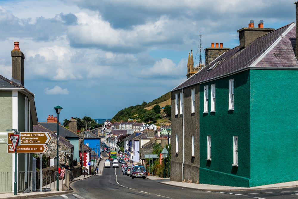 The main coastal road runs through Aberaeron, with colorfully painted Georgian houses.