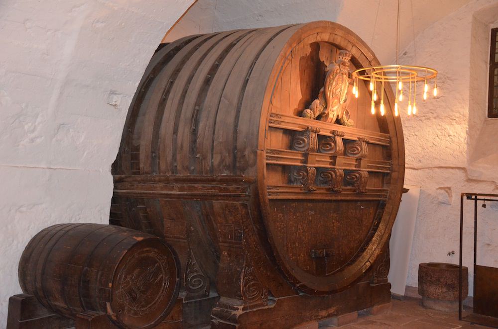 I gaze in awe at one of the largest wine vats in the world—it’s two stories high