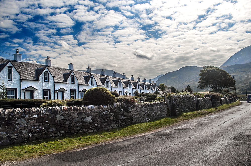 Formerly tithed parish cottages, the Twelve Apostles are a favourite photo op on the west coast. They have a spectacular view across to Kintyre.