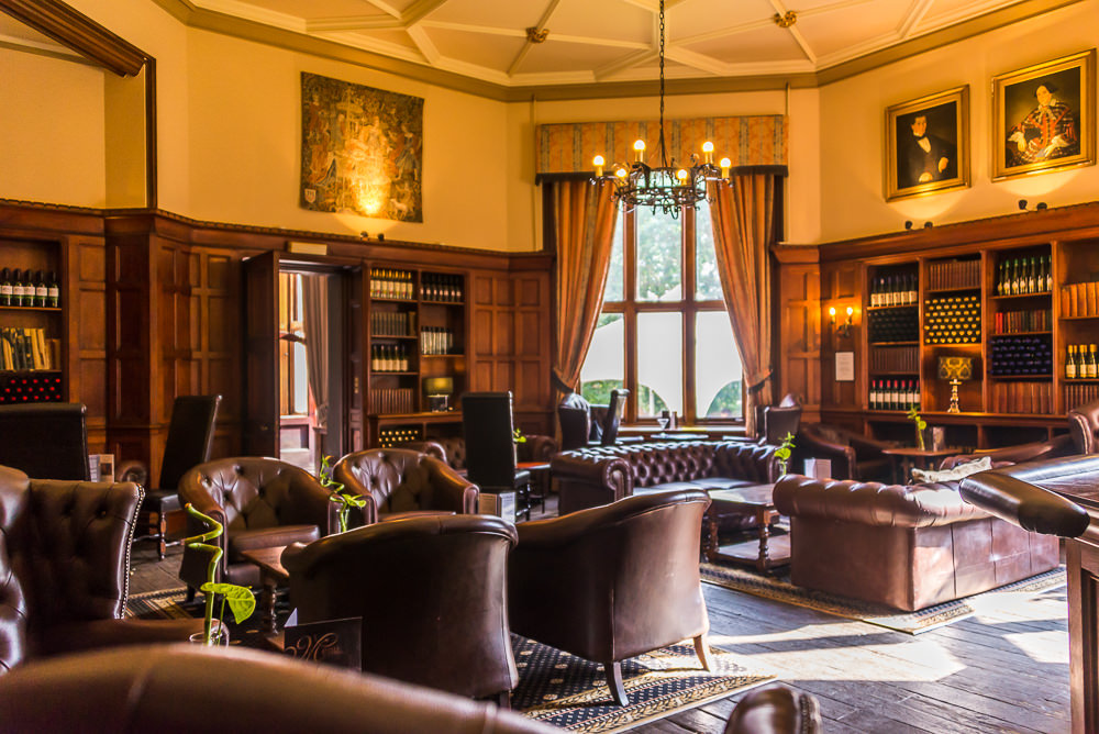 The castle’s hallways and lounges are regally outfitted like a baronial mansion
