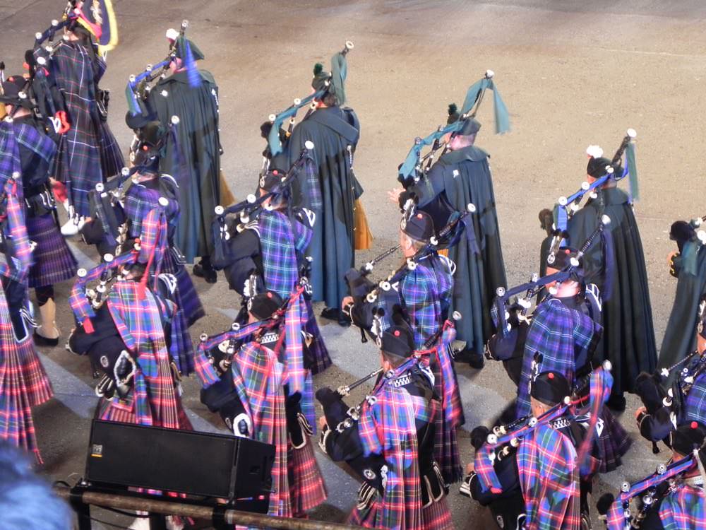 Beautifully clad in tartans, these pipers march in unison at the Edinburgh Tattoo
