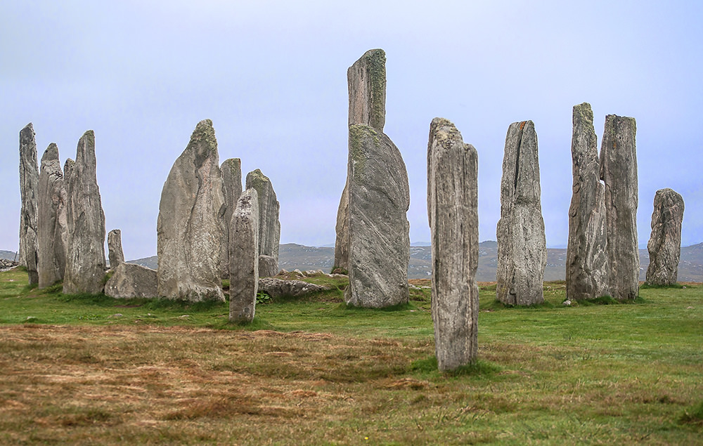 In high season the main circle of the Calanais Standing Stones is fenced off for visitors, but at the end of September we wandered freely among the stones. In the centre is a chambered cairn (tomb) that was added later, maybe 500 to 700 years after the circle was built.