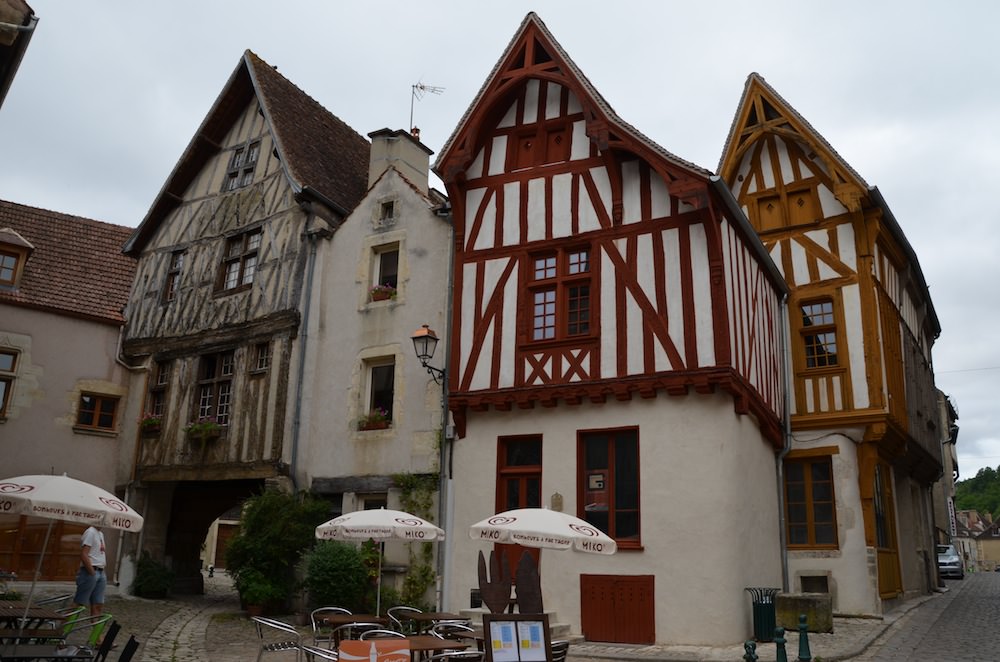 Noyers-sur-Serein has numerous well maintained 15th century houses, their crooked walls inset with stained cross beams and filled in with white painted plaster