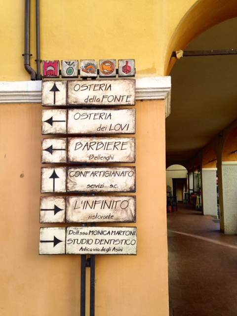 Street signs in Brisighella, Italy