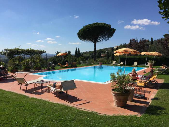 The view to and beyond the pool at Il Falconiere