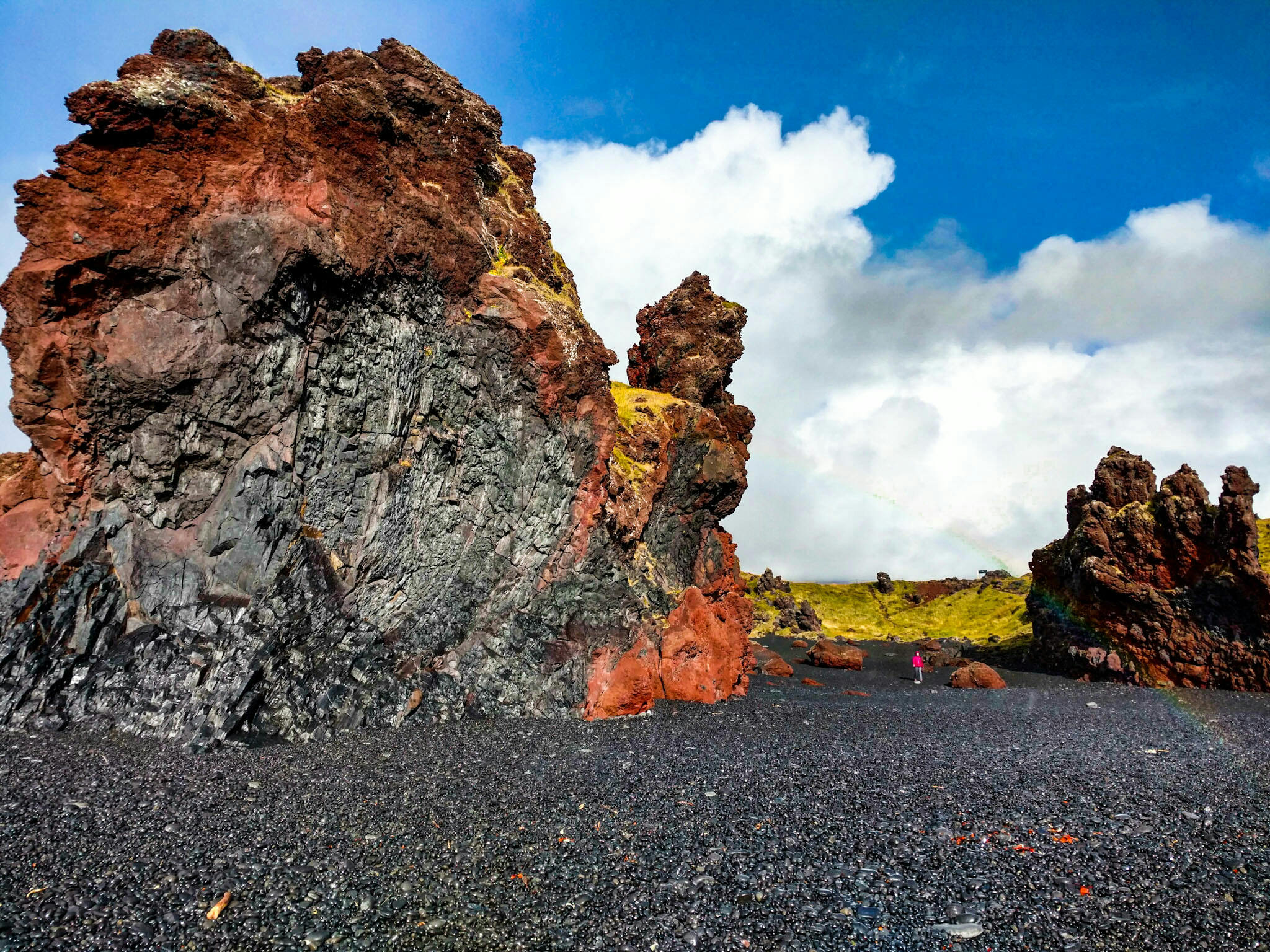 Black Beaches Iceland with red rock formations - Photos of Iceland
