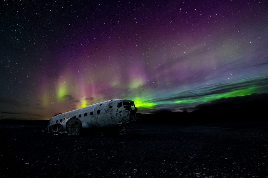 Iceland Northern Lights over a rusty crashed plane - Photos of Iceland - Aurora Borealis in Iceland