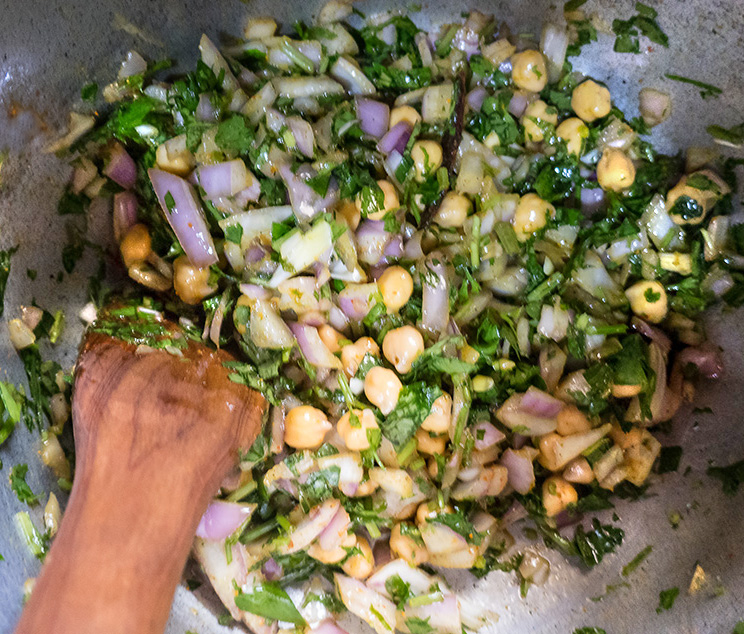 Moroccan Tajine: Starting soup - Slow cooking the onions, chickpeas, garlic, parsley, and cilantro, which start the traditional Harira soup that breaks the Ramadan fast in many homes. 