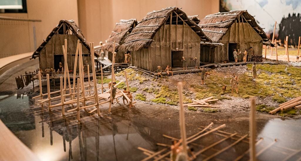 Model depicting daily life in Pile Dwelling Settlement - Prehistoric Pile Dwellings around the Alps Museum in Fiavé Trentino Italy