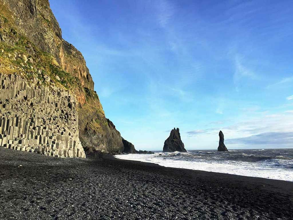 Black Sand Beach with basalt columns in the back - Vik Black Sand Beach Iceland Game of Thrones Film Locations