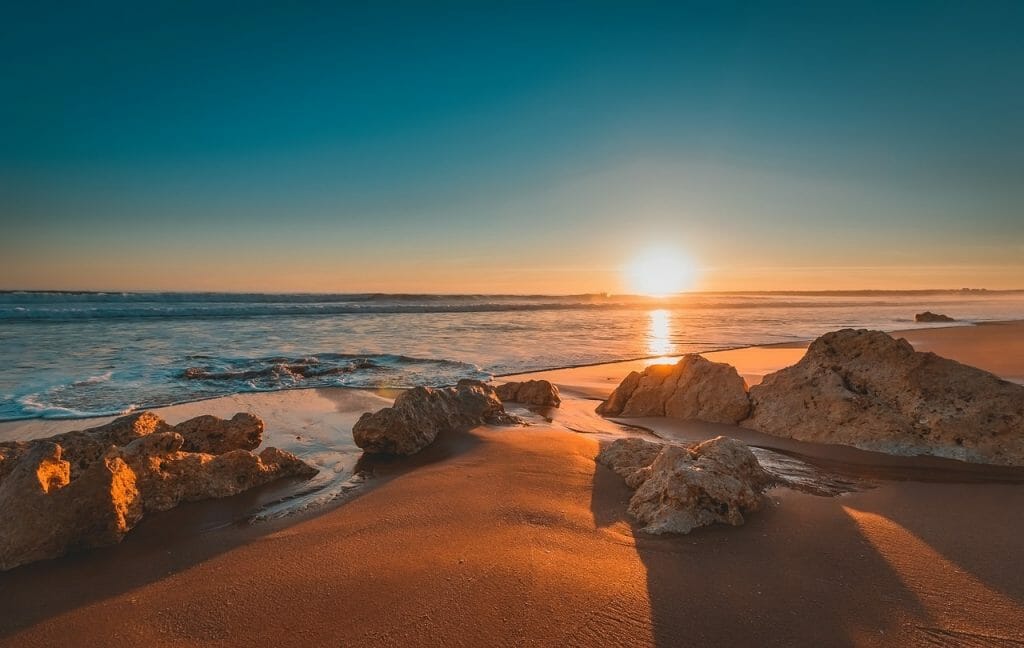 Beach with Rocks in Portugal at Sunset