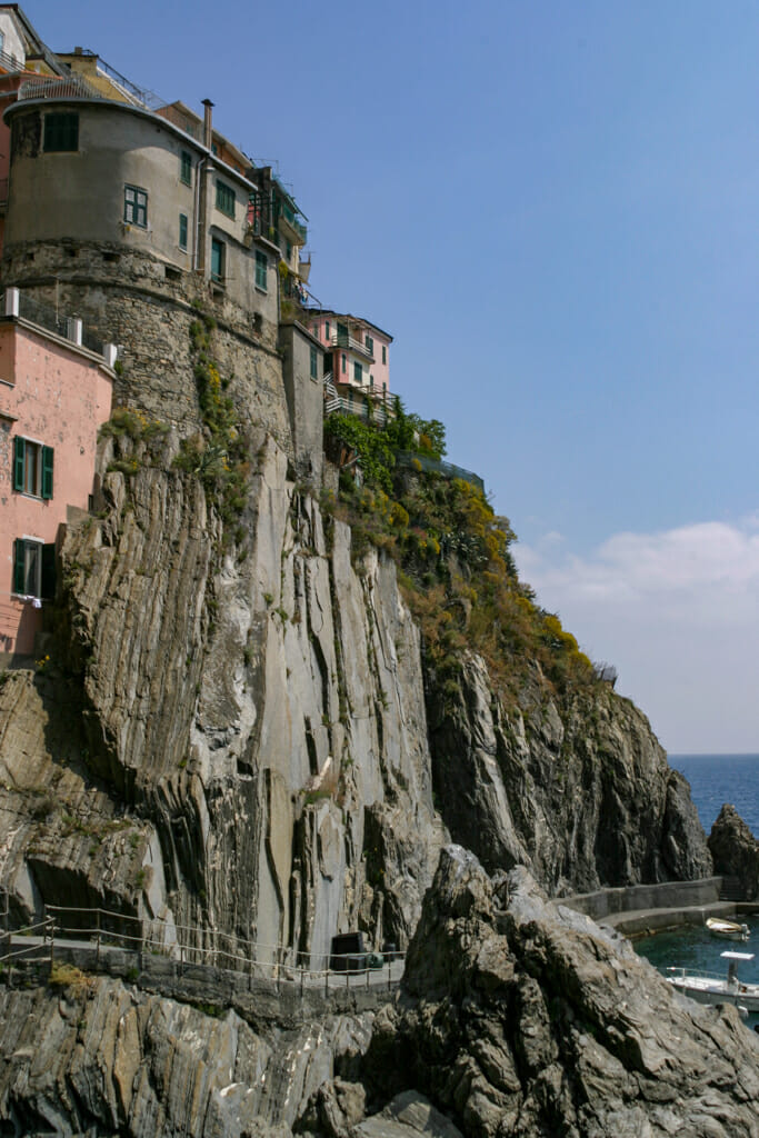 Parco Nazionale coast trail between Manarola and Corniglia with houses emerging out of the stone.