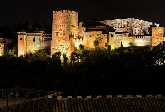 Alhambra palace lit up in the dark night 