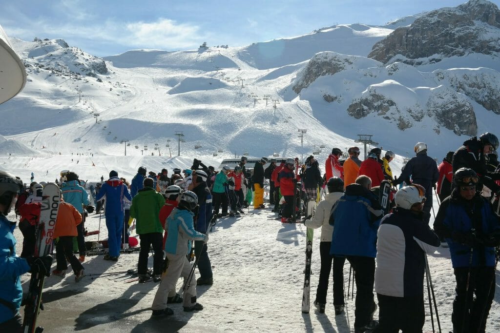 Skiers waiting to get on the ski lifts in Ischgl