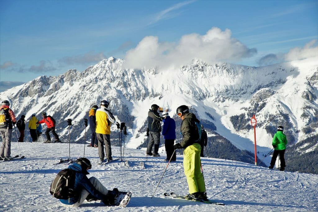 Skiers at the top of the ski run