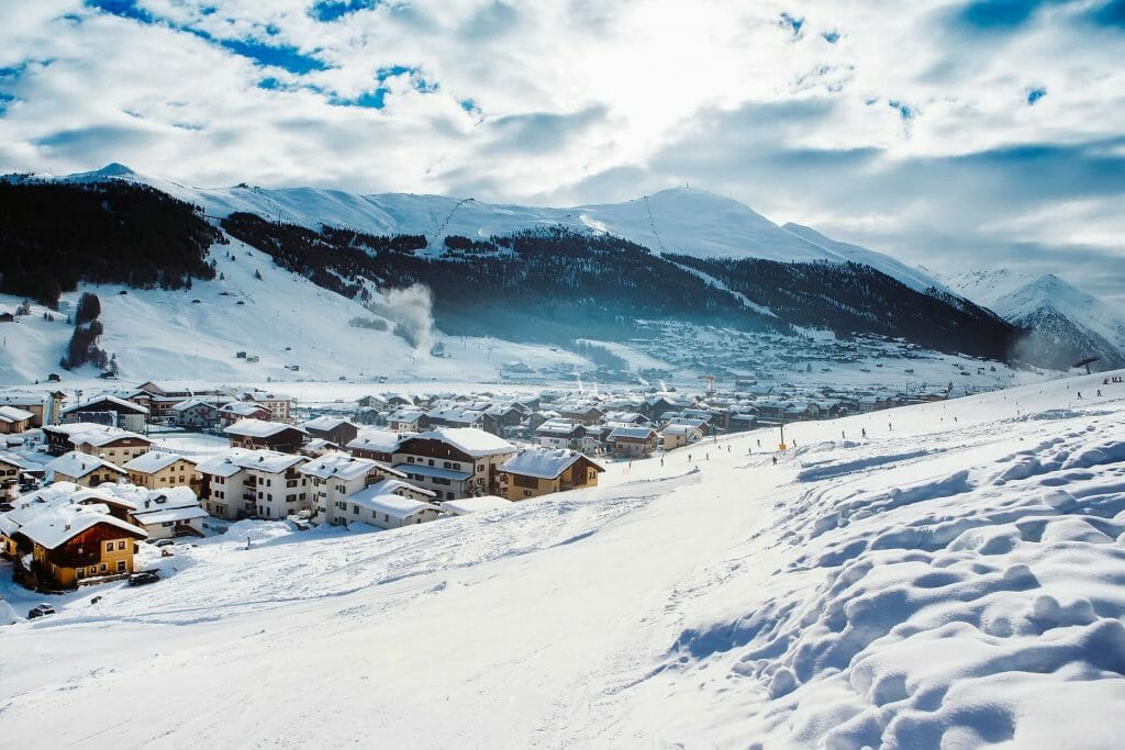 Italian village at the edge of a snowy plain
