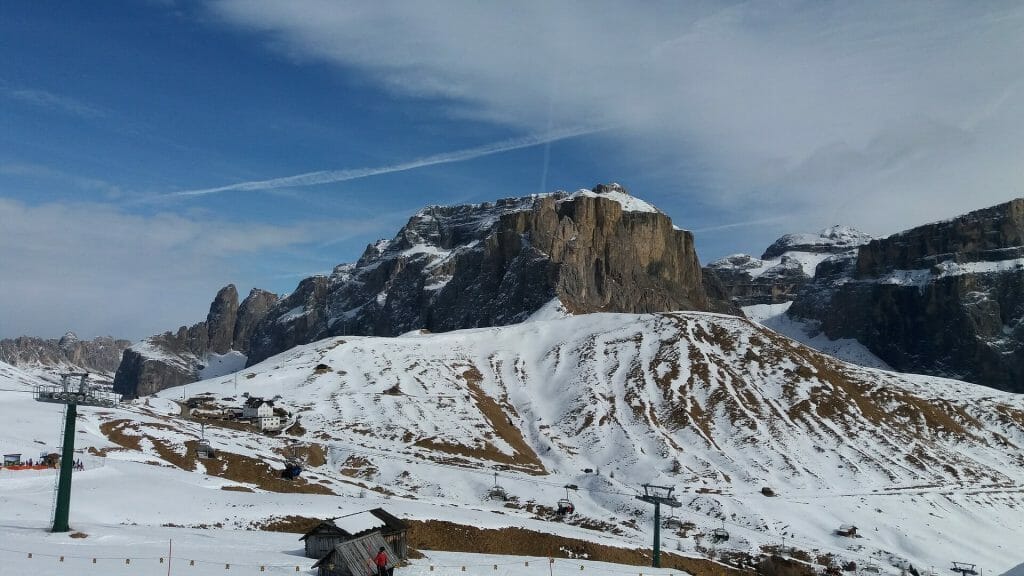 Ski lifts going over the beautiful wild slopes of Sella Ronda, Italy