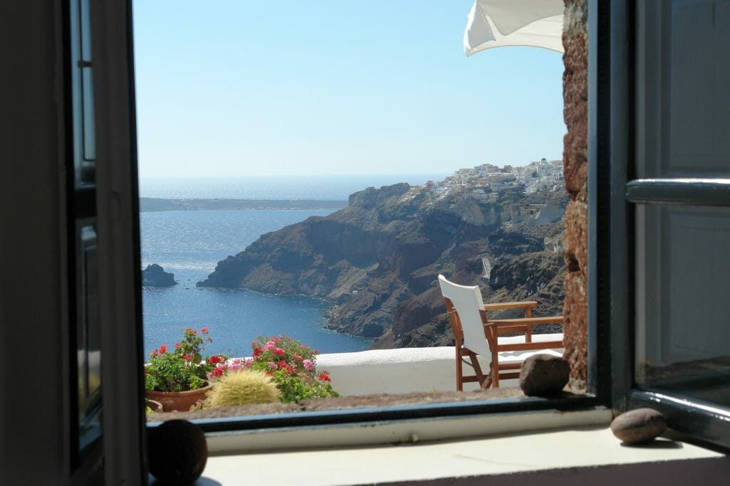 View of Santorini from the window with the cliffs overlooking the ocean
