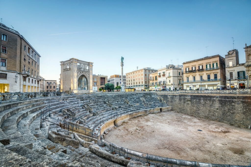 Ancient amphitheater in city center of Lecce, Puglia, Italy