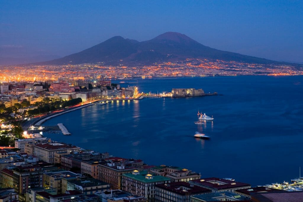 Bay of Naples Italy with the Vesuvio vulcano in the background during blue hour
