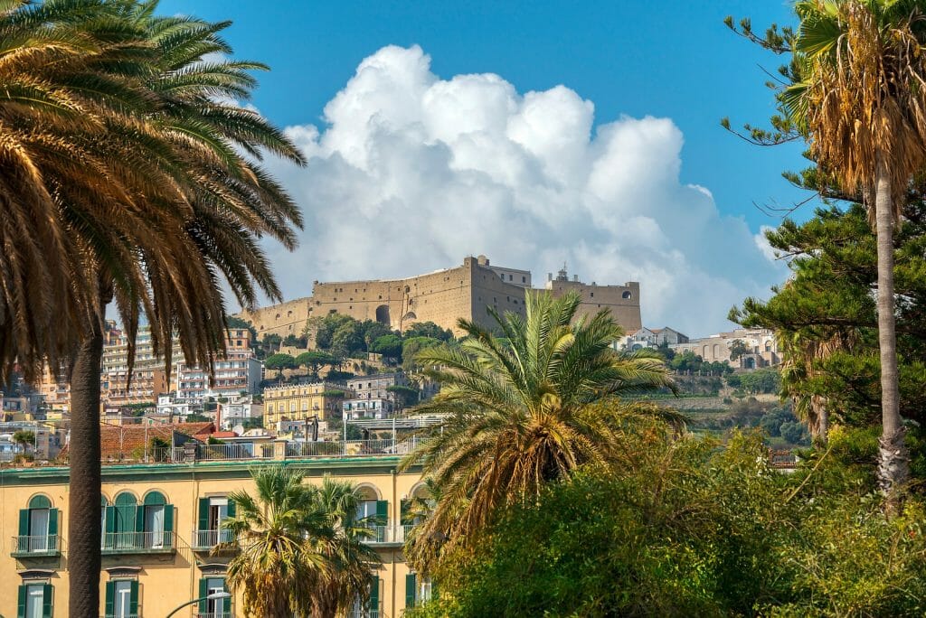 cityscape with Castel Sant Elmo, medieval fortress located on a hilltop near the Certosa di San Martino, Naples, Italy
