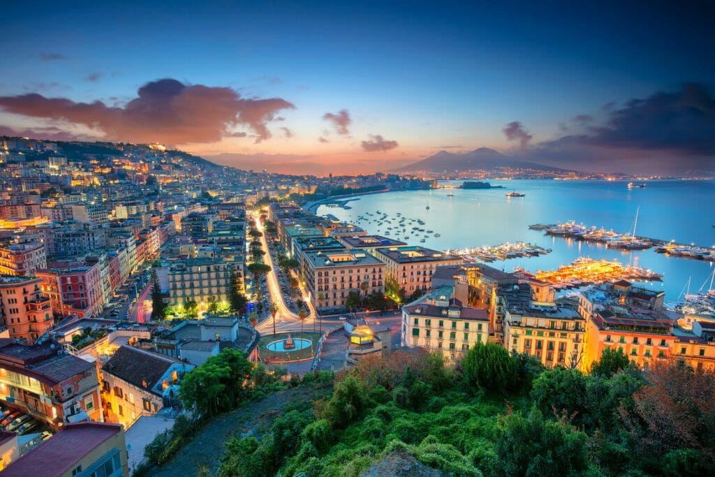 Things to do in Naples Italy - Aerial cityscape image of Naples, Campania, Italy during sunrise.