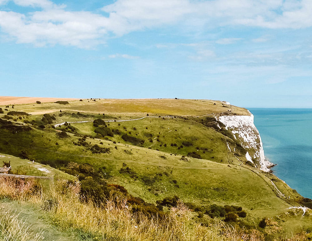View of green grassy plateau at the white cliffs of dover - Things to do in Dover