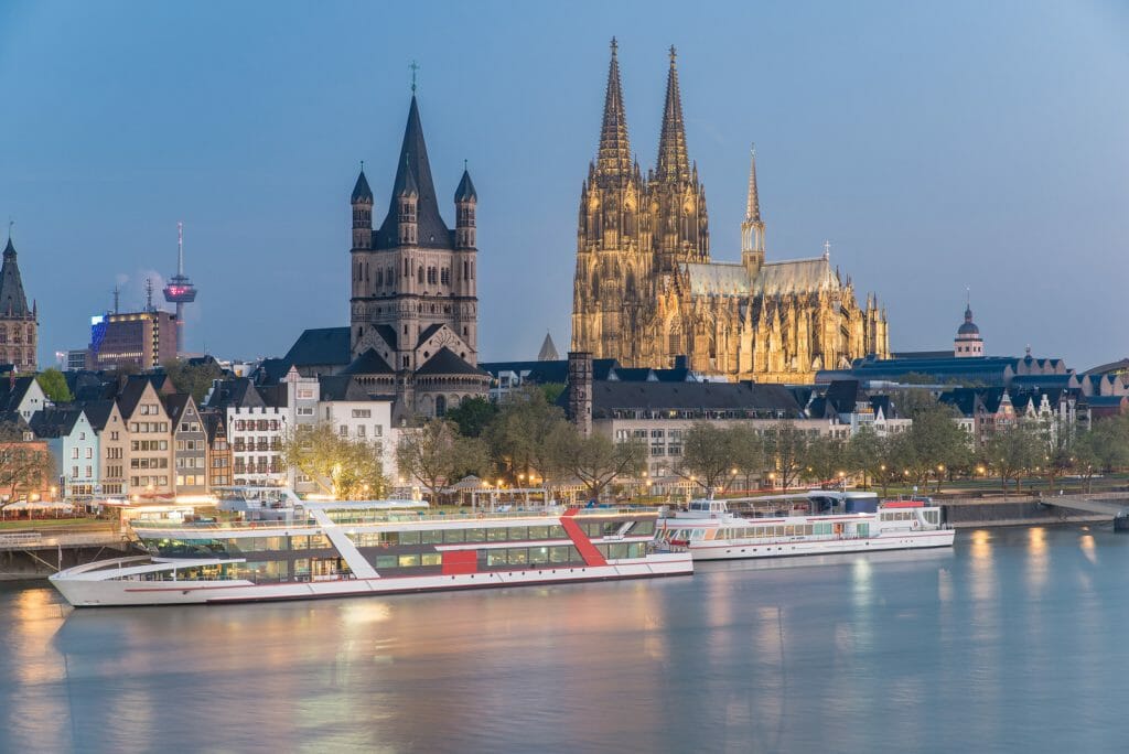 Aerial view over the Rhine River with cruise ship in Cologne, Germany