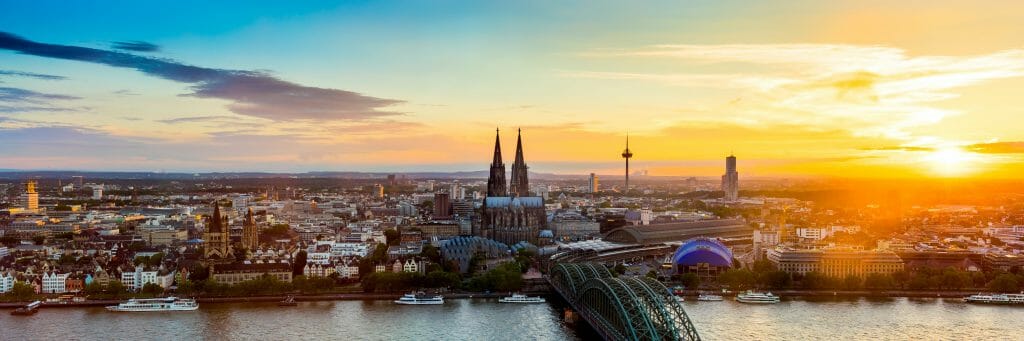 Panoramic picture of Cologne Germany Skyline at sunset