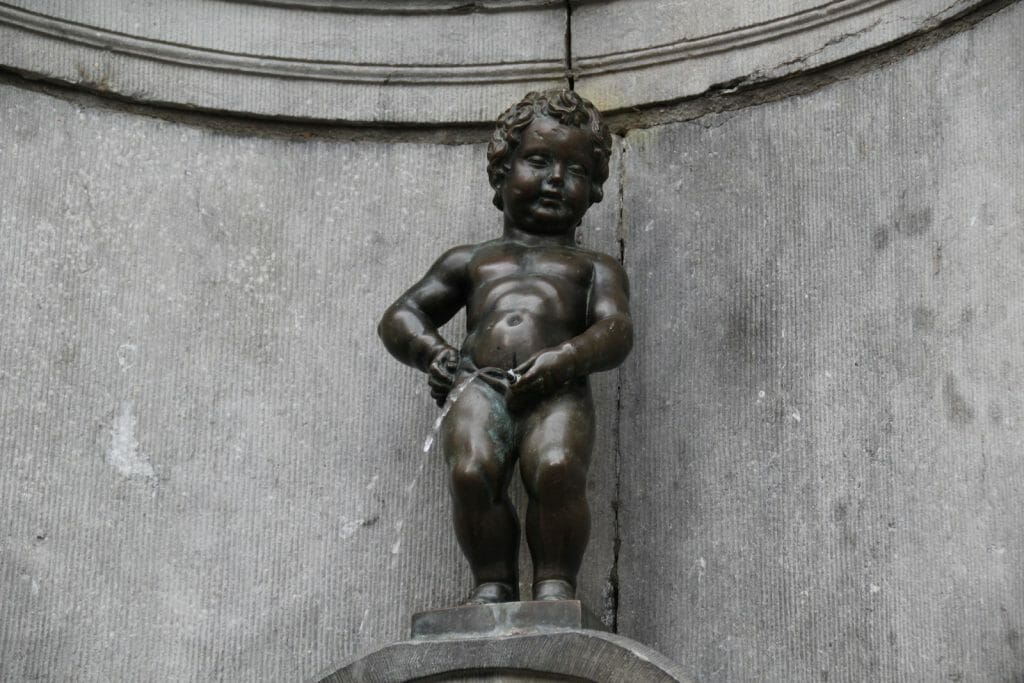 Manneken Pis fountain with little boy peeing, Brussels, Belgium.