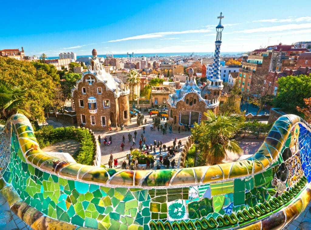 Weekend in Barcelona view over Park Guell in Barcelona, Spain with brightly colored Gaudi buildings