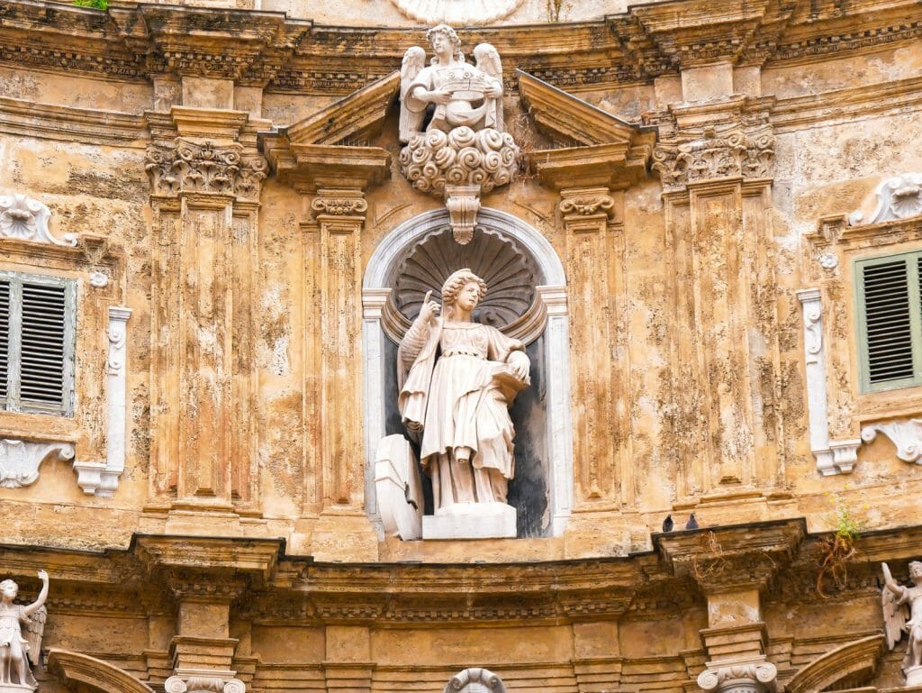 Statue of Santa Cristina in The Four Canti, or piazza Villena, is the name of an octagonal square in the historic center of Palermo with the beautiful decorations of the buildings of 1606