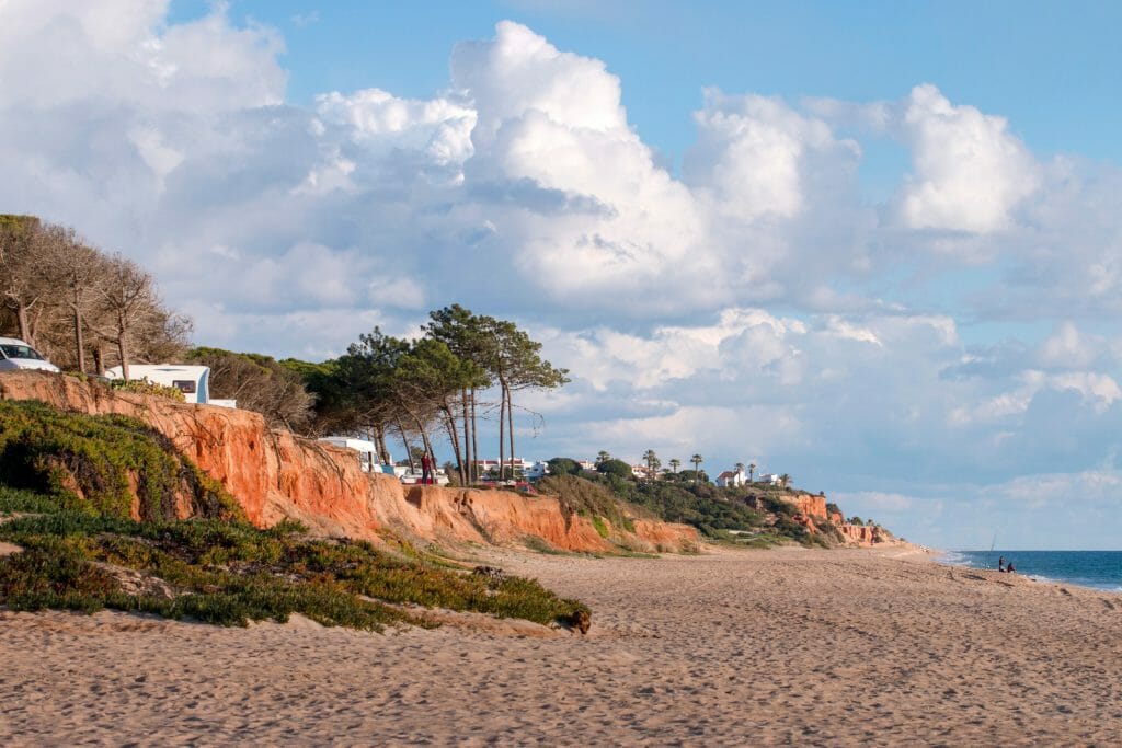 Beautiful sandy beaches and pine trees in Quarteira, Algarve, Portugal