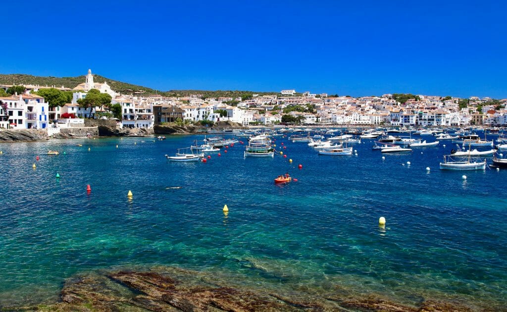 Main view of Cadaqués bay and village, from "Es Llaner Gran" beach, Costa Brava, Mediterranean Sea, Catalonia, Spain.