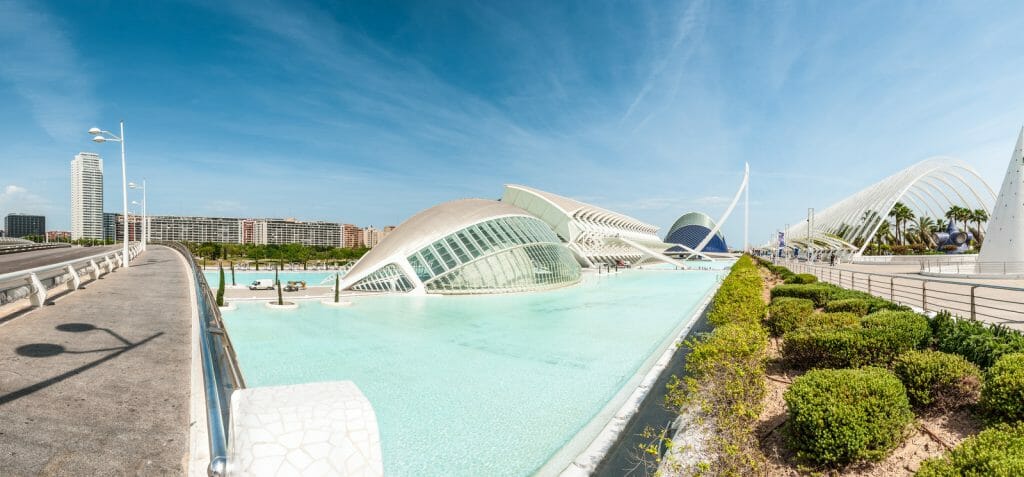 Modern white building surrounded by turquoise water pools - modern architecture in Valencia Spain