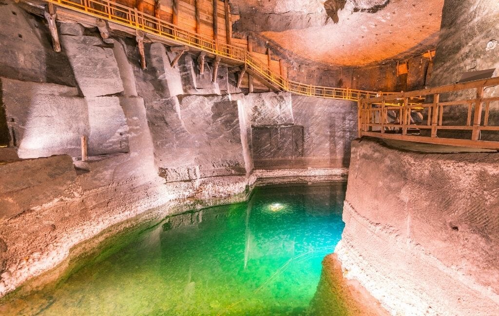 Turquoise pool inside Wieliczka salt mine in Poland