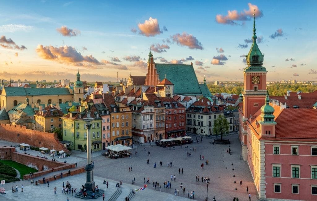 aerial shot of Warsaw old town with royal palace during sunrise