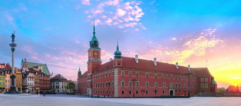 Panoramic view of the red brick building that is the royal castle in Warsaw Poland