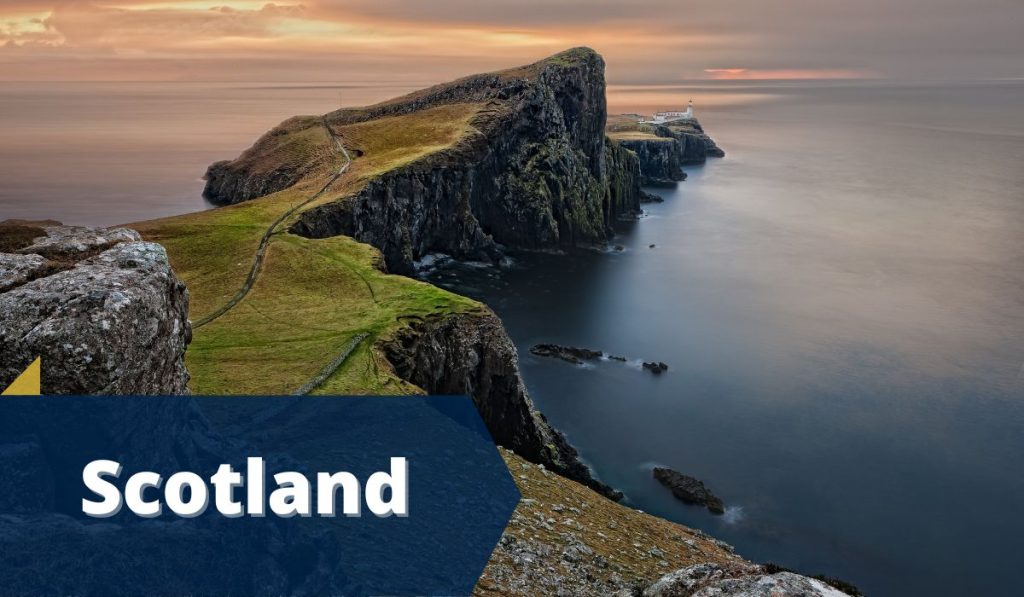 rugged Scottish Coastline, blue ribbon in the bottom left corner white text Scotland
