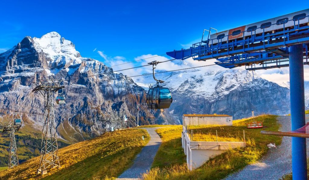 Gondola Stop on top of First Mountain with the swiss alps in the background