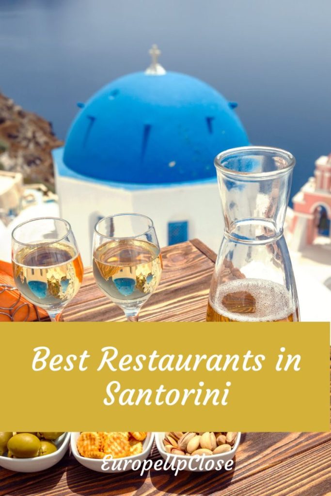 Picture of santorini blue domes with text overlay: Best Restaurants in Santorini