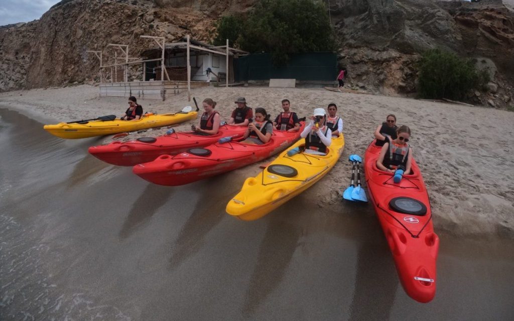 Kayaks on the beach in Milos ready for take off